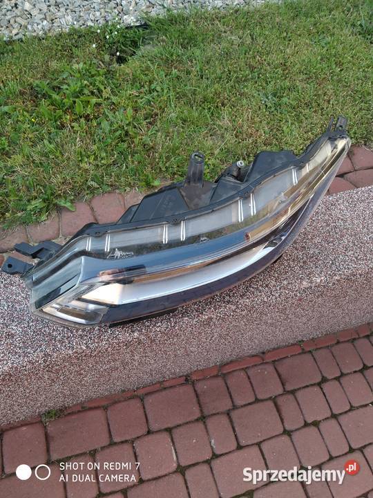 sprzedam reflektor nissan qashqai J11przedni Oświetlenie Krasne