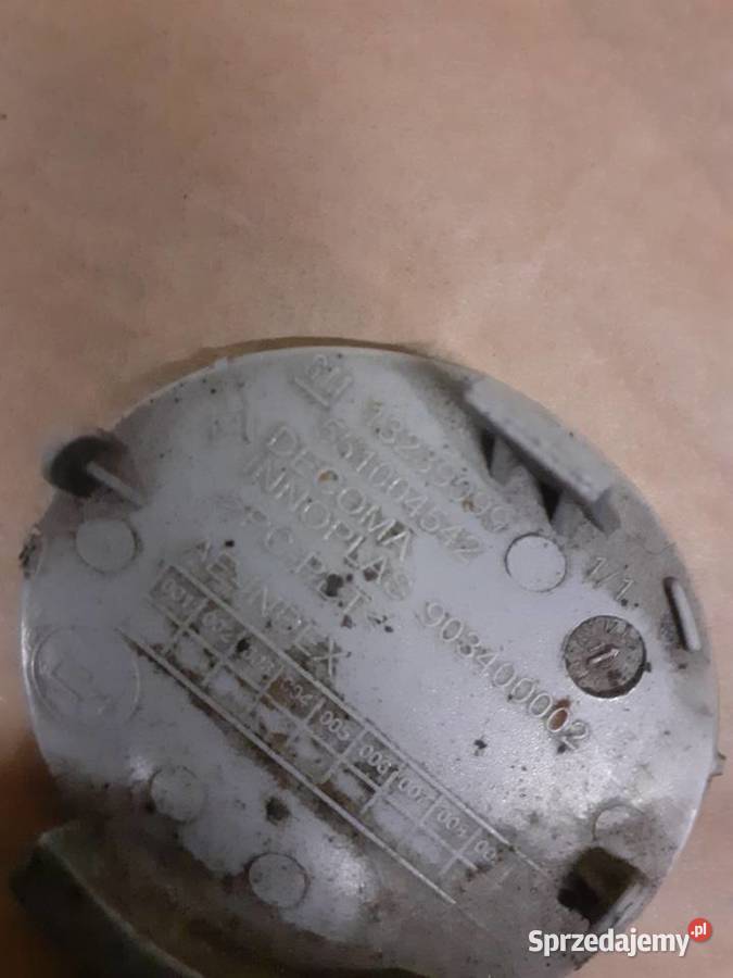 Opel OE 13239099 zaślepka zderzaka insignia osobowe Boruja Kościelna