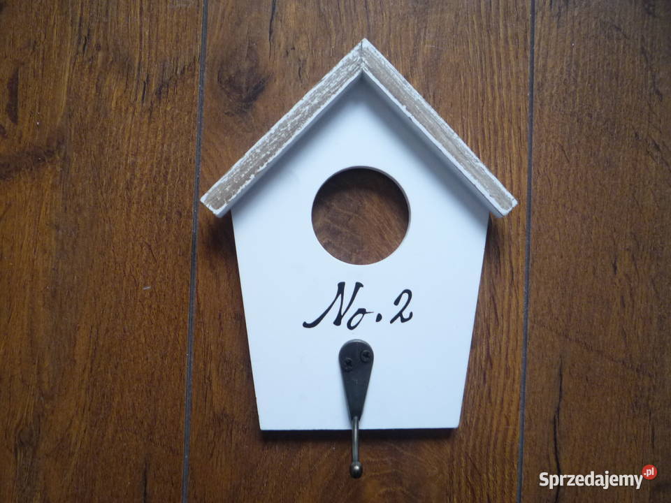 Biały wieszak na kurtki w kształcie domeku Szczecin