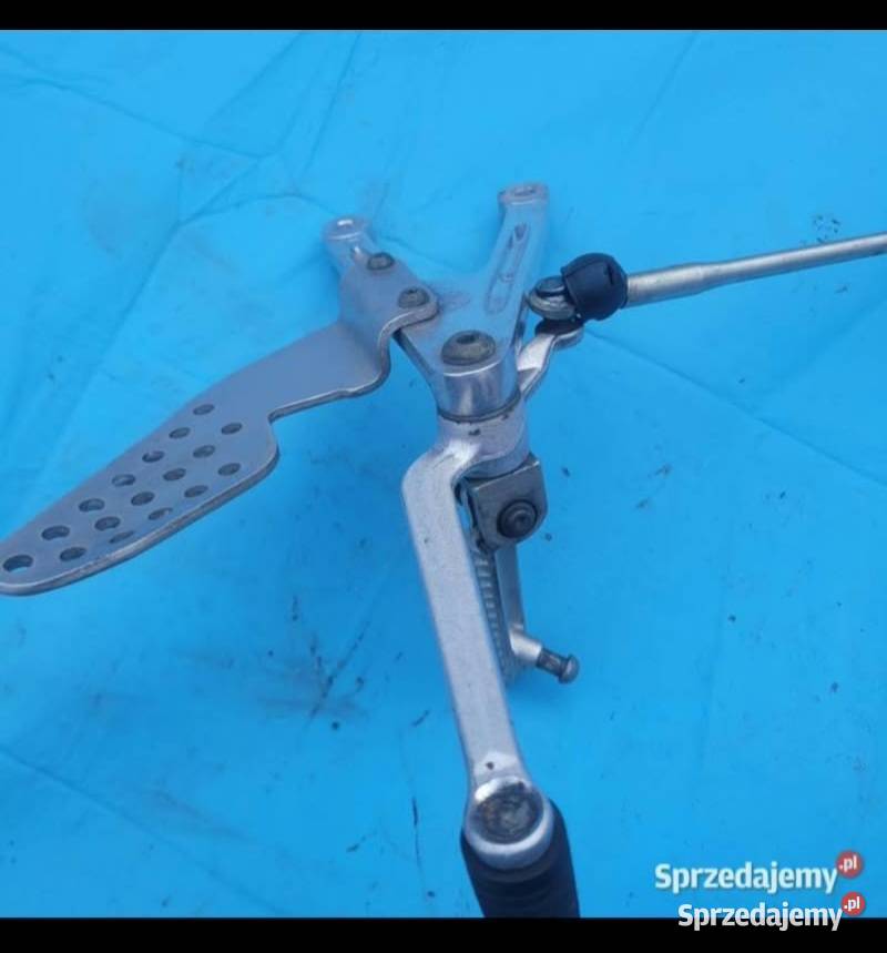 YAMAHA R1 RN09 0203 OEM SET PODNÓŻEK DŹWIGNIA Podnóżki i stopki Nowy Tomyśl