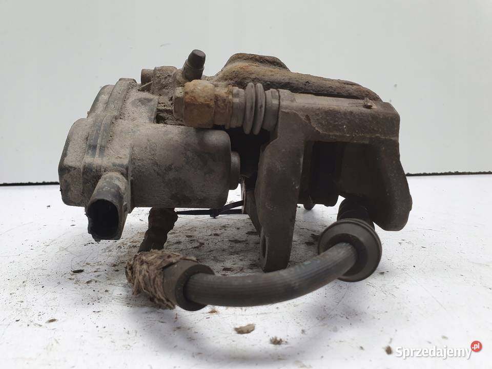 Audi Q5 TYLNY ZACISK HAMULCOWY prawy tył osobowe Motoryzacja Janów sprzedam