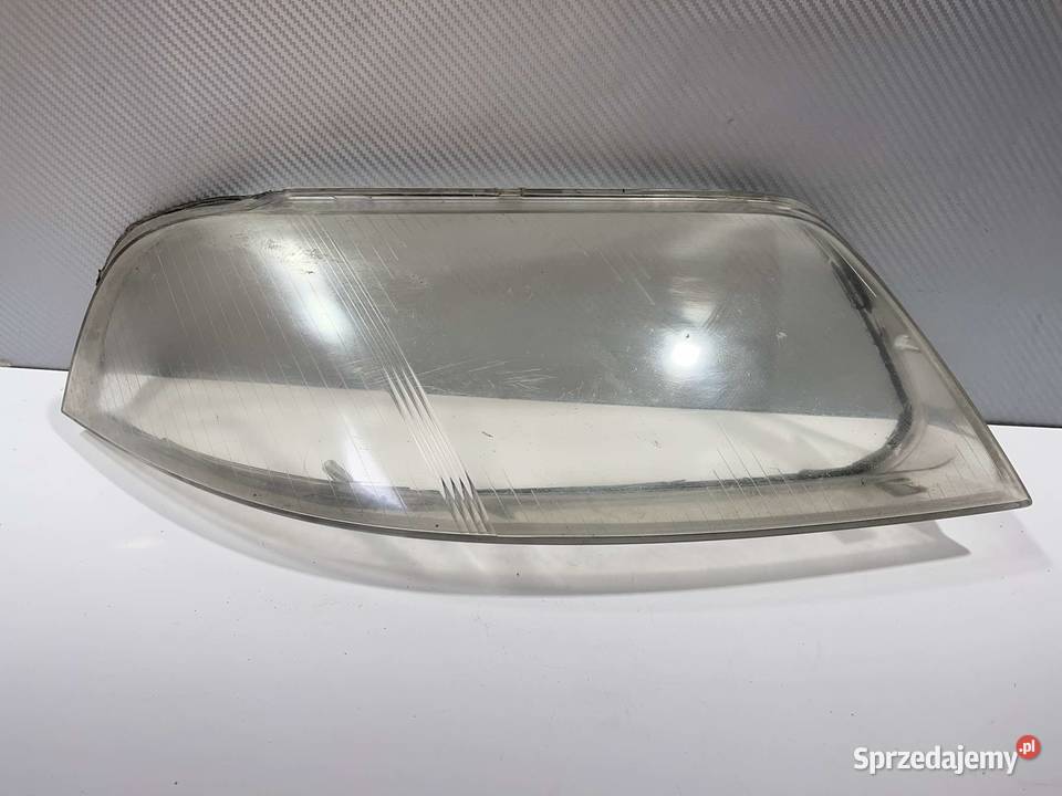 VW PASSAT B5 LIFT PRAWY KLOSZ HELLA Lampy przednie Ostroróg