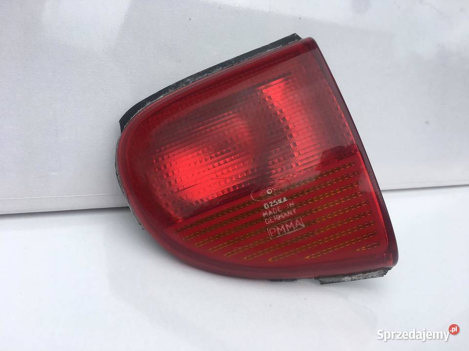 FORD ESCORT PRAWA LAMPA W KLAPĘ Ostroróg