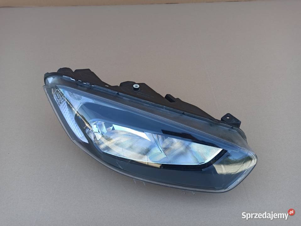 TRANSIT TOURNEO COURIER REFLEKTOR PRAWY LAMPA Trzciel