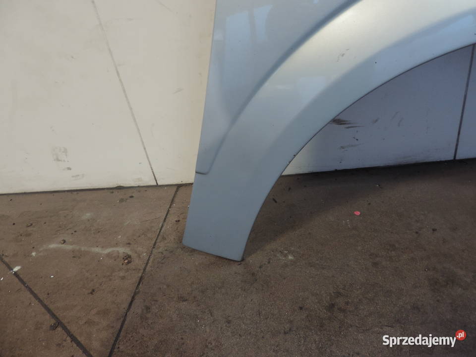 BŁOTNIK PRAWY PRZEDNI PRZÓD OPEL ASTRA H III FL Błotniki