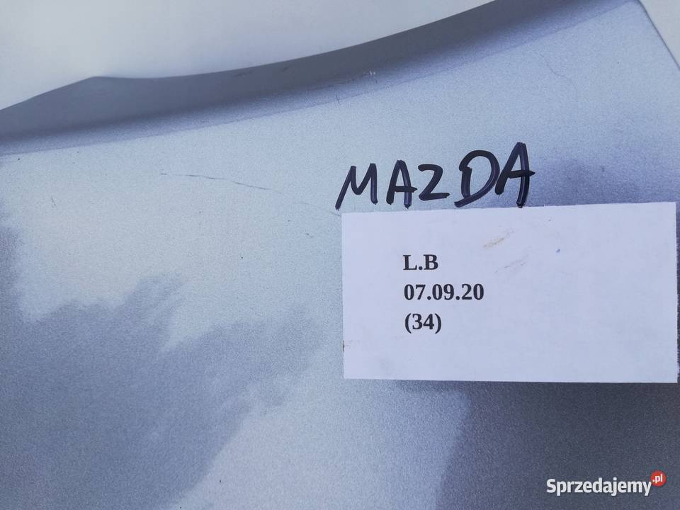BŁOTNIK MAZDA III 0912 LEWY PRZÓD Nowy Tomyśl