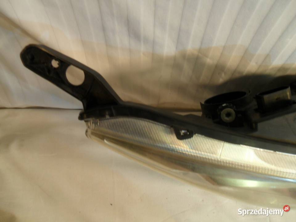 LAMPA PRAWY PRZÓD REFLEKTOR AV1113W029CD osobowe Nowy Tomyśl