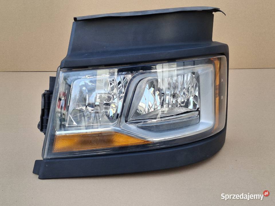 SCANIA R S REFLEKTOR LEWY H7 LAMPA LEWA RAMKA Bieleń
