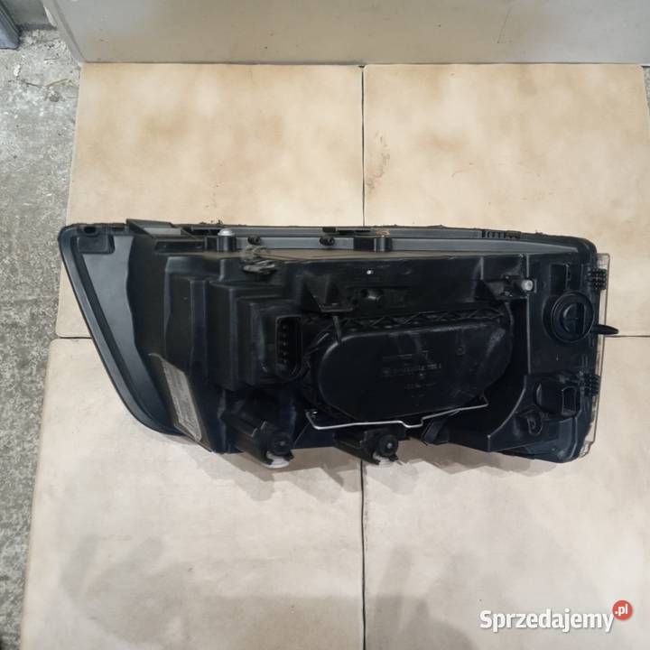 VW T5 multivanH7H7l reflektor lewy orginal lewe