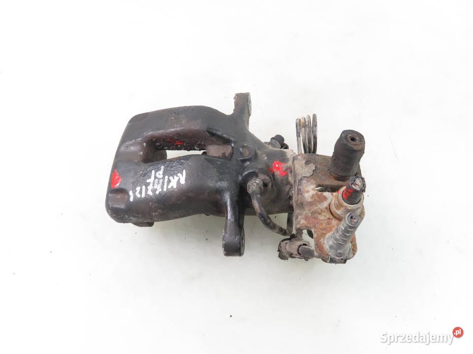 ZACISK PRAWY TYŁ VW CADDY III