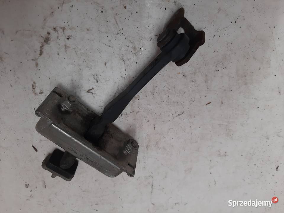 Opel Corsa D 5 D Lewy Przedni ogranicznik drzwi Ksawerów