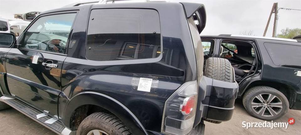 ĆWIARTKA BŁOTNIK LEWY TYŁ MITSHUBISHI PAJERO IV Pozostałe Lipno