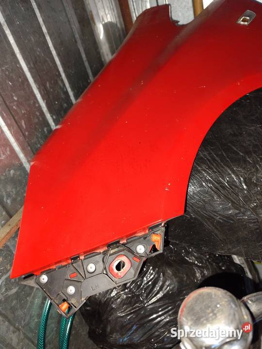 Błotnik przedni lewy Corsa D czerwony Rok produkcji 2007 Błotniki śląskie Zawiercie