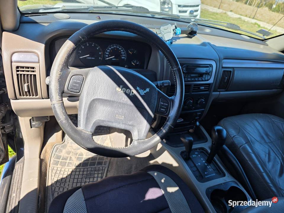 Samochód Jeep Grand Cherokee 4L 2004 Benzynagaz uszkodzony Grand Cherokee Reda