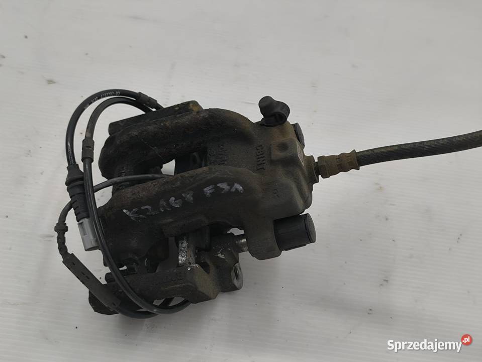 ZACISK PRAWY TYŁ BMW F31 20D LIFT osobowe Zaciski i jarzma sprzedam