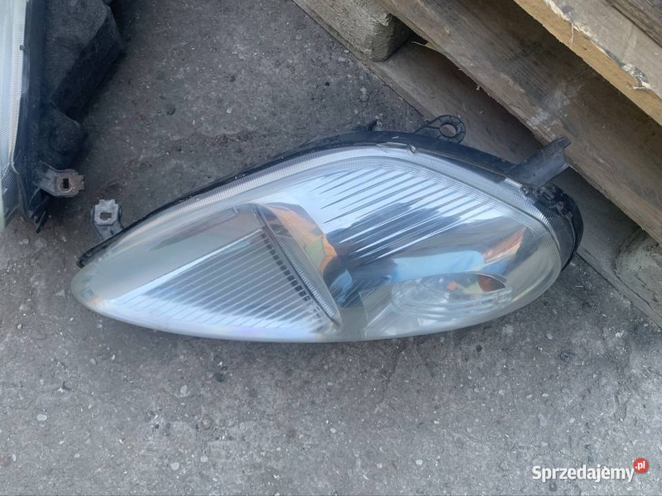 Reflektor lampa przód lewa prawa fiat grande Lampy przednie Szczecin