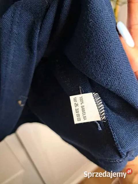 Stylowa koszulka polo Haier z czerwonym Trąbki Wielkie