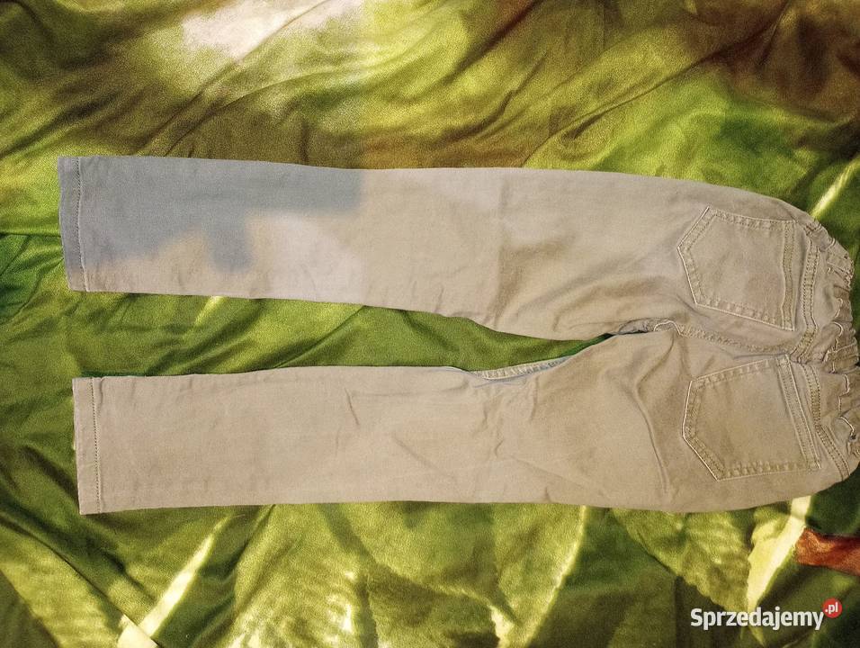 Spodnie skiny khaki dziury 134 Rozmiar 134 Przemyśl
