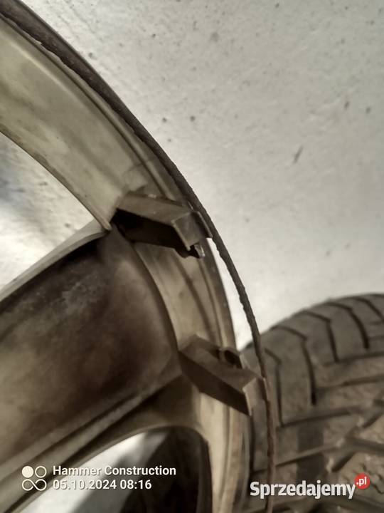 BMW seria E90 zimowe koła z kołpakami Włodzimierzów