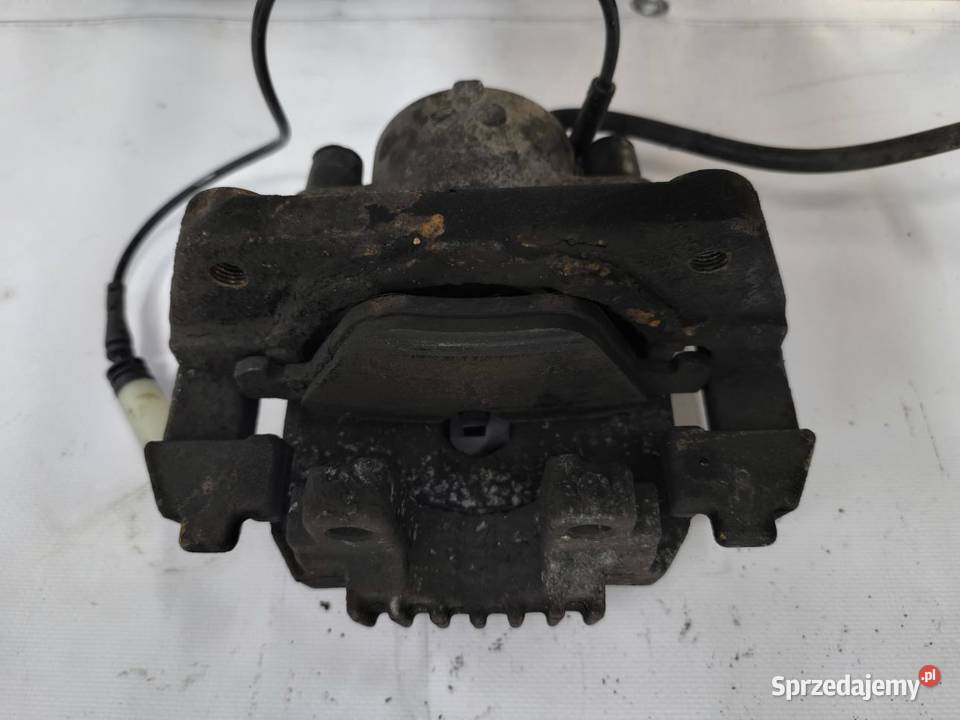 ZACISK HAMULCOWY LEWY PRZÓD 25D BMW E61