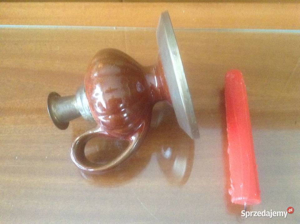 Stary kaganekświecznik ceramiczny z metalowymi