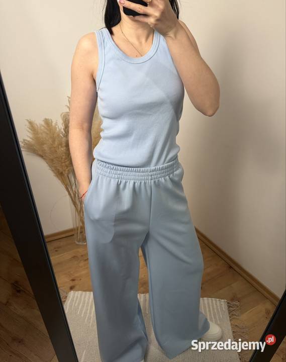 Błękitny prążkowany top na ramiączkach rozmiar Ostrzeszów