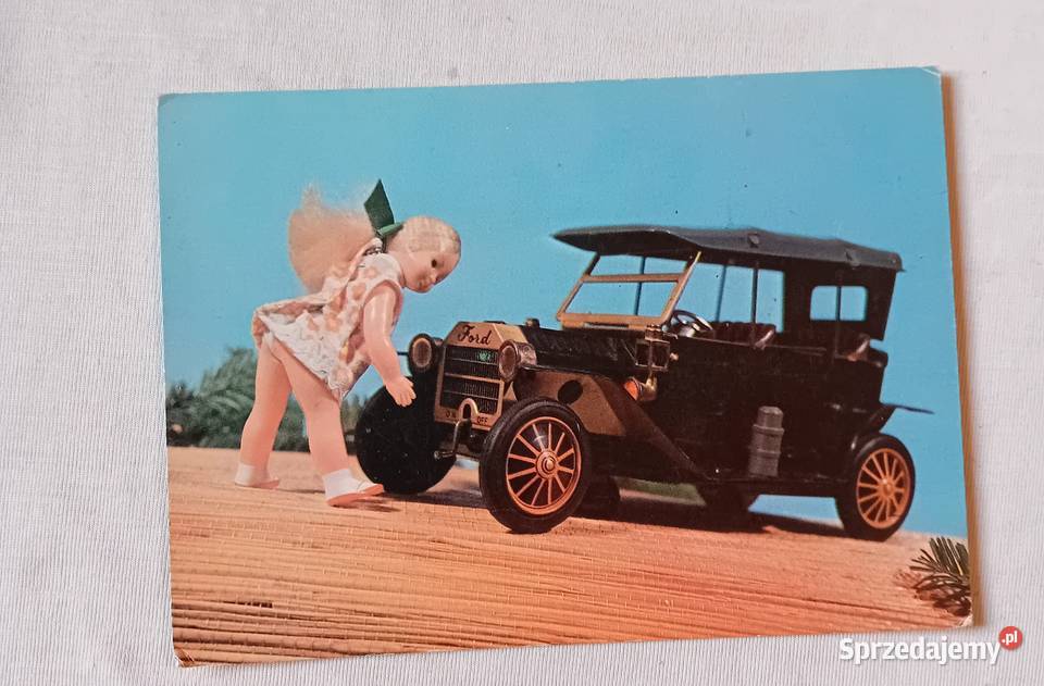 Pocztówka o tematyce bajkowej lalka i Koźminek