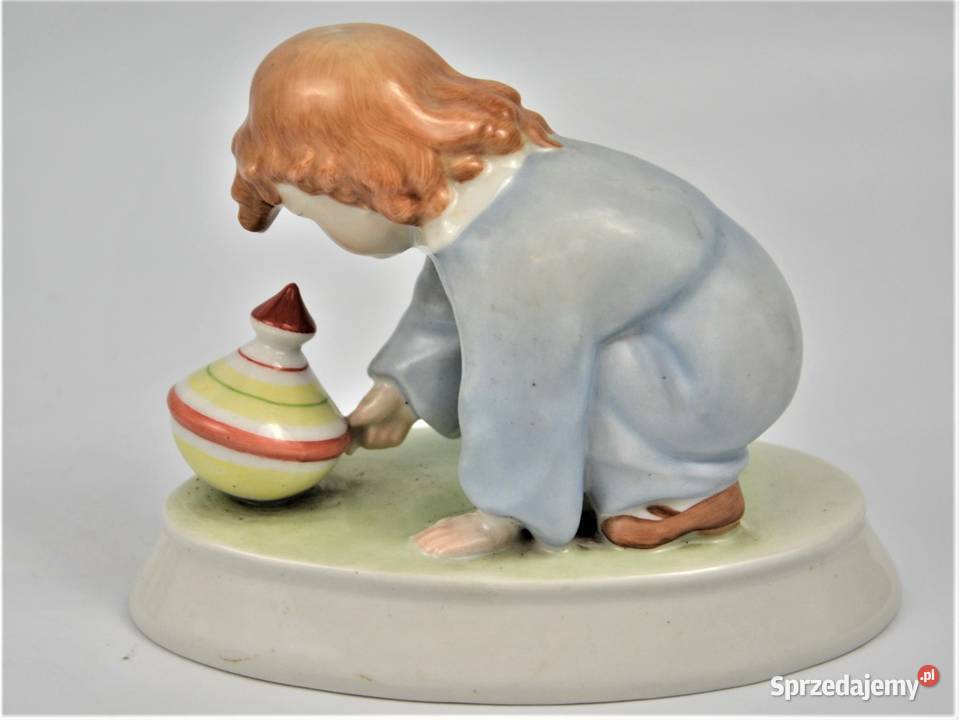 dziecko bawiące się bączkiem projekt Sinko mazowieckie Warszawa sprzedam