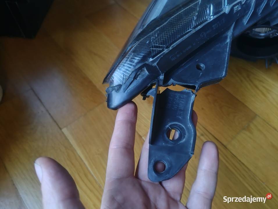 Mazda 2 0714 lampa reflektor lewa przednia przód Ślesin