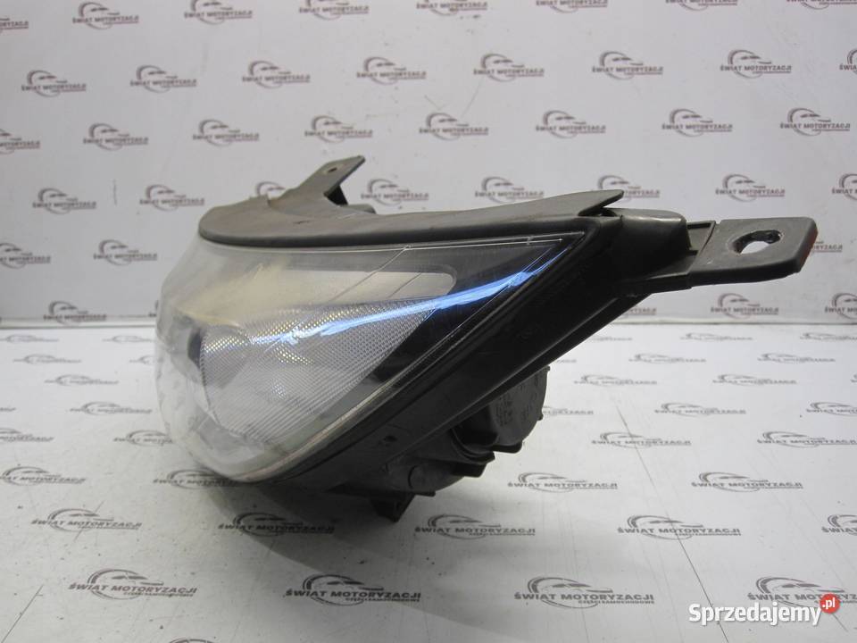 KIA SPORTAGE III 12r lampa lewa przód 921013WXXX