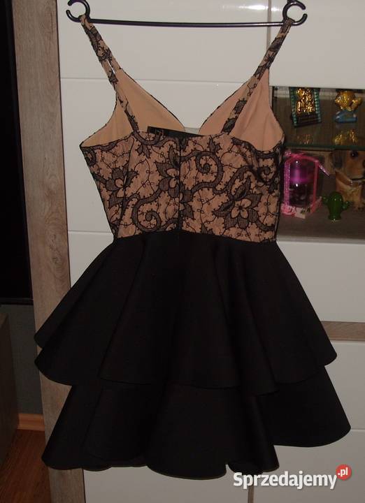 Rozkloszowana FORTI NOWA sukienka z koronką i bez rękawa Rawicz