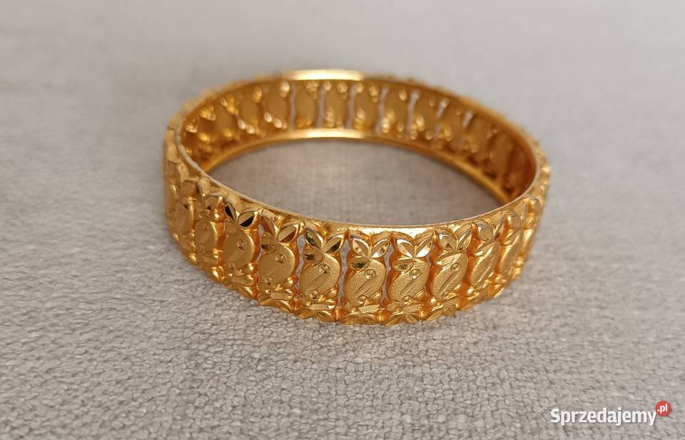 Szeroka bransoletka w kolorze złota z Radzyń Podlaski