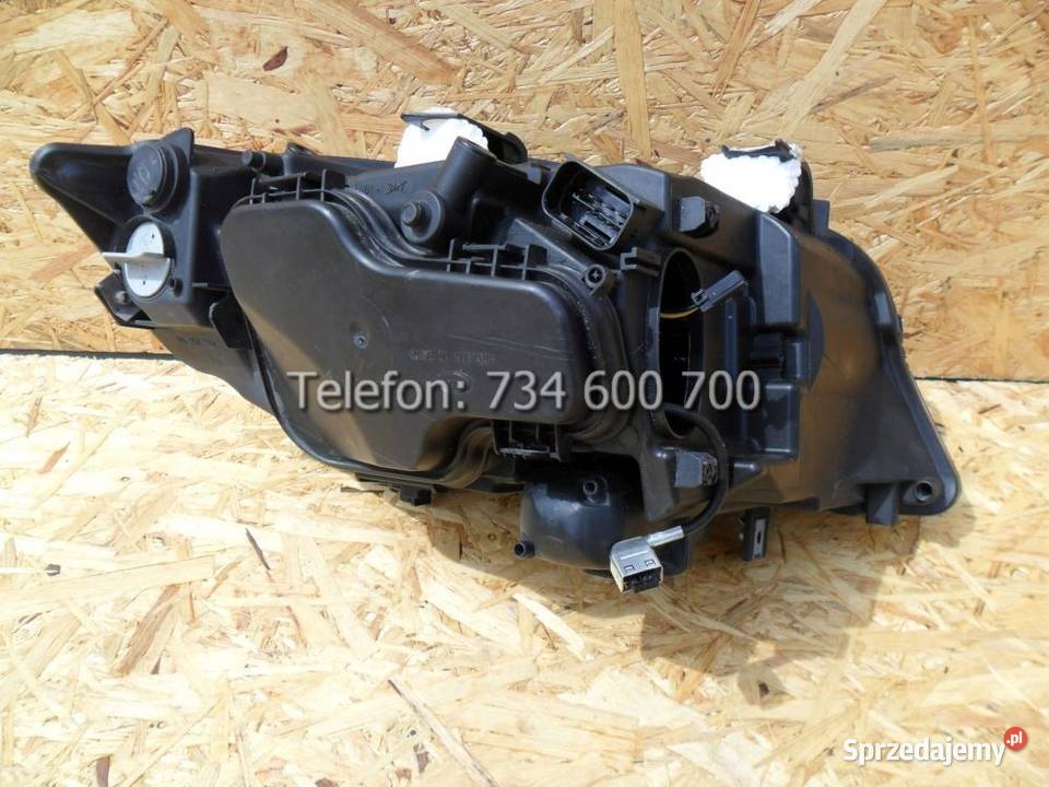 Reflektor lewy xenon BMW E90 2004 2005 2006 2007 Nowy Tomyśl