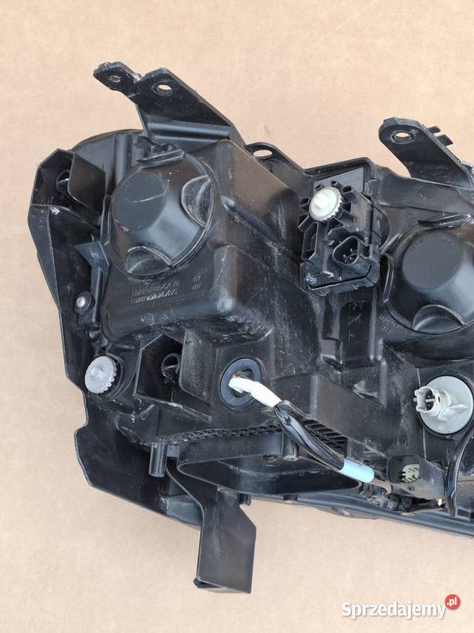 FORD RANGER III LIFT 15 REFLEKTOR LEWY HIR2 H15 osobowe Bieleń