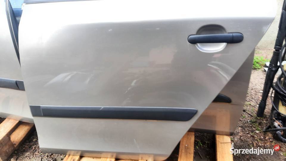 drzwi lewe tylne Skoda Fabia II lak 9202 0714r Dębno