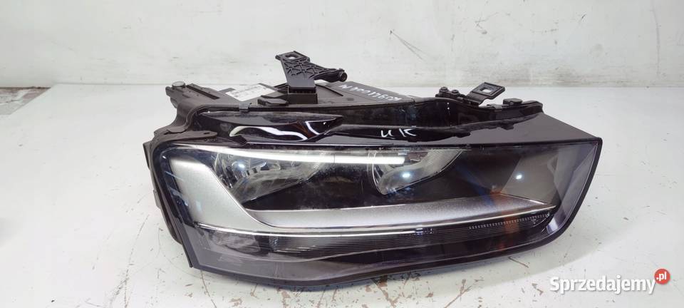 REFLEKTOR PRAWY AUDI A4 B8 LIFT UK 8K0941004M osobowe Przystajń