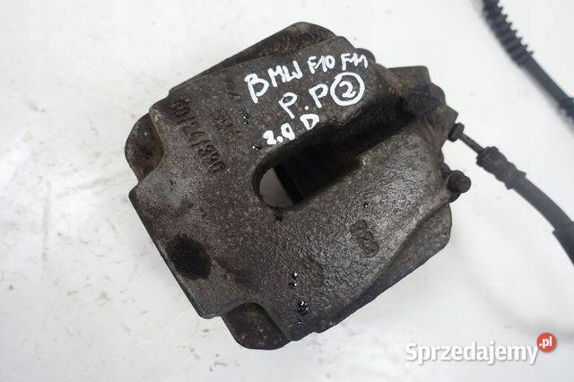 BMW F10 F11 20 D PRZEDNI ZACISK HAMULCOWY prawy Janów