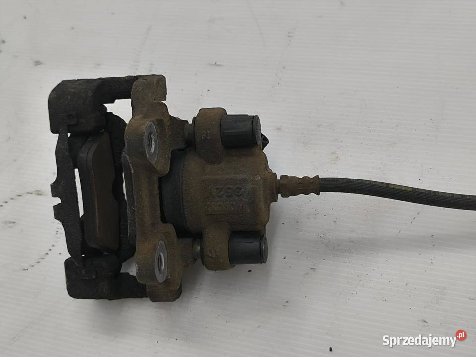 ZACISK LEWY TYŁ BMW F30 F31 20D LIFT