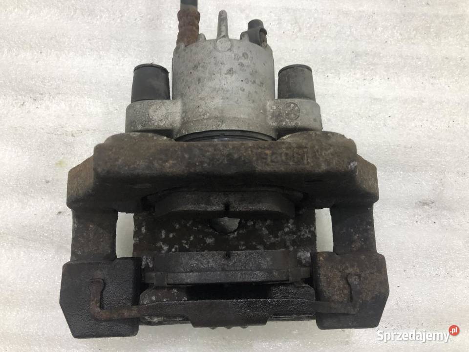 ZACISK HAMULCOWY LEWY TYŁ BMW E60