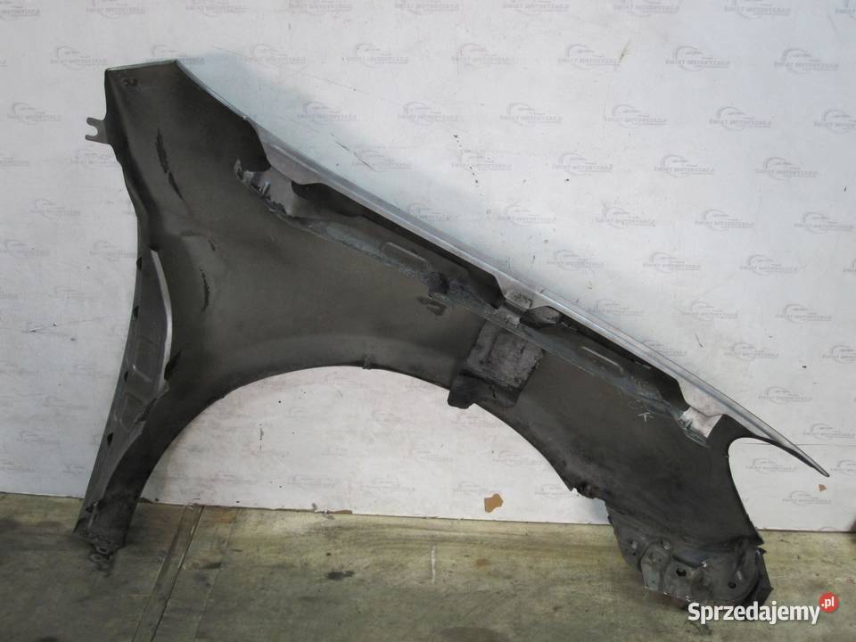 VW GOLF VI 10r błotnik lewy przód
