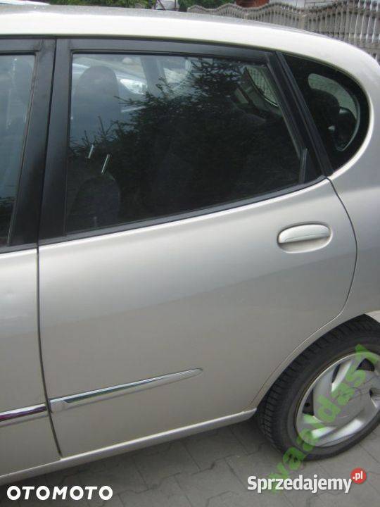 DAIHATSU SIRION 0205R DRZWI TYŁ LEWE KOD S26 Rakoniewice