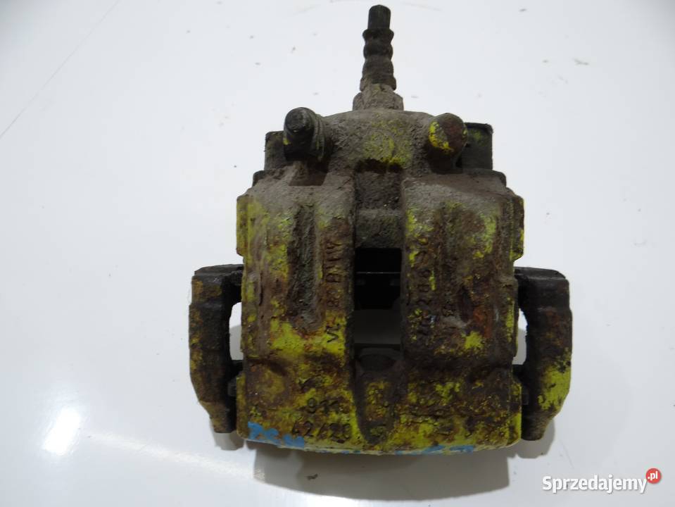 ZACISK HAMULCOWY PRAWY TYŁ BMW E90 E91 N52 4220 Strzyżewice