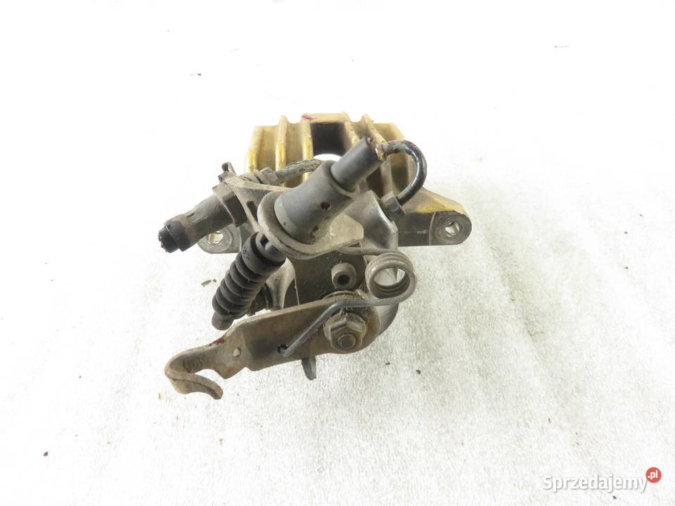 ZACISK LEWY TYŁ VW GOLF VI 16 TDI