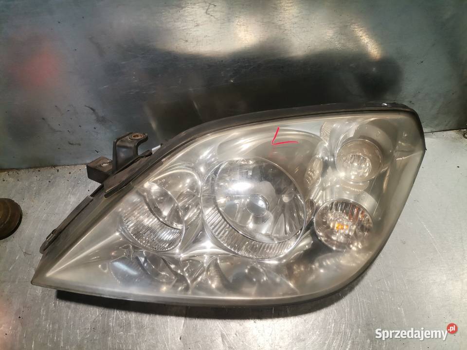 REFLEKTOR LAMPA LEWY PRZÓD XENON NISSAN PRIMERA osobowe Nowy Sącz