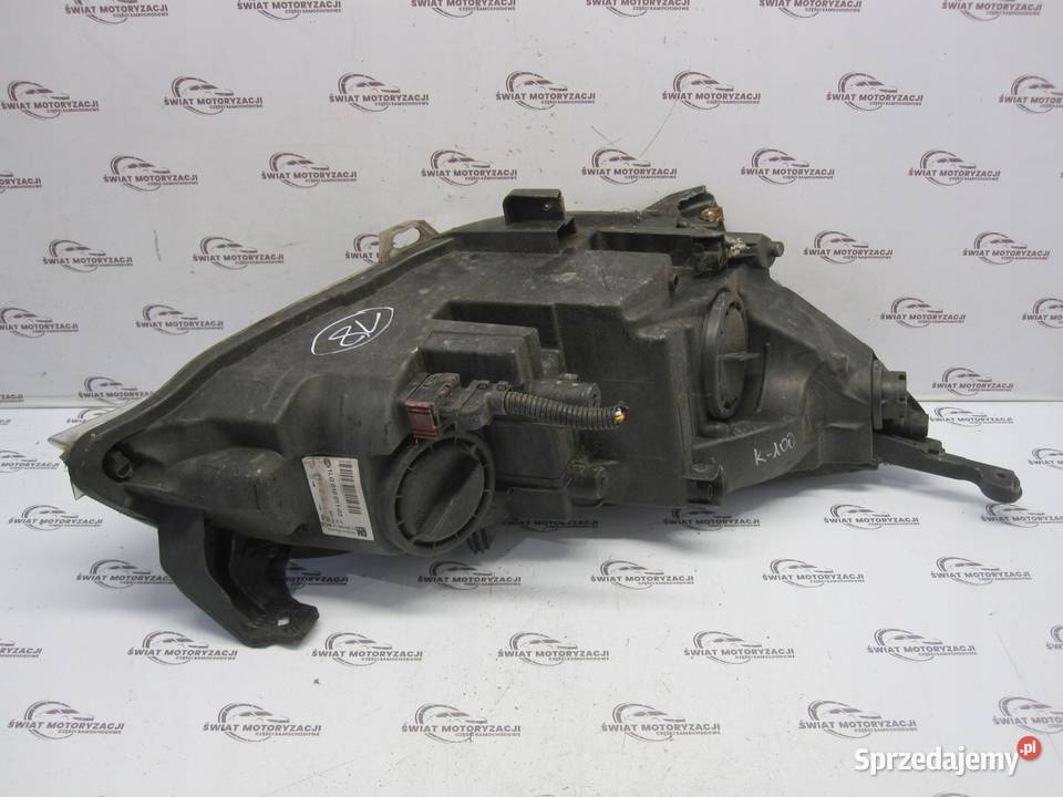 OPEL ASTRA J 10r lampa lewa przód 13253656