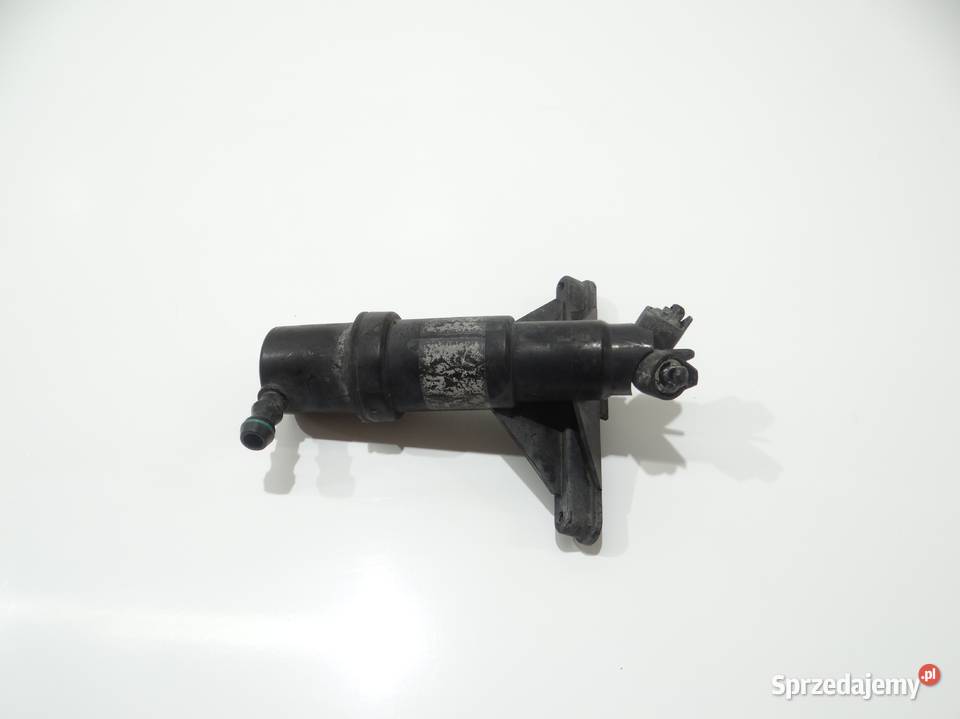 DYSZA SPRYSKIWACZA LAMPY LEWA BMW E60 E61 osobowe Strzyżewice