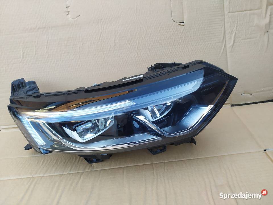 Koleos II reflektor lewy lampa lewa przód Oświetlenie