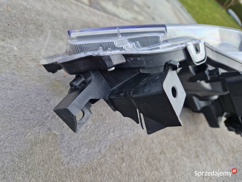 Toyota Corolla E21 sedan reflektor ORG EU Motoryzacja