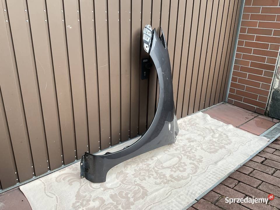 BŁOTNIK PRAWY PRZÓD TOYOTA COROLLA E15 0710 Pleszew