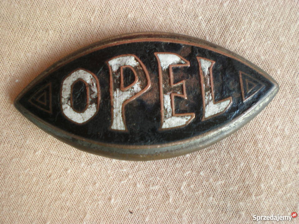 Stare kilkudziesięcioletnie metalowe logo OPEL lubuskie